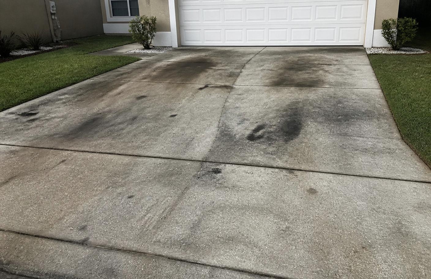 Featured driveway restoration — before pressure washing